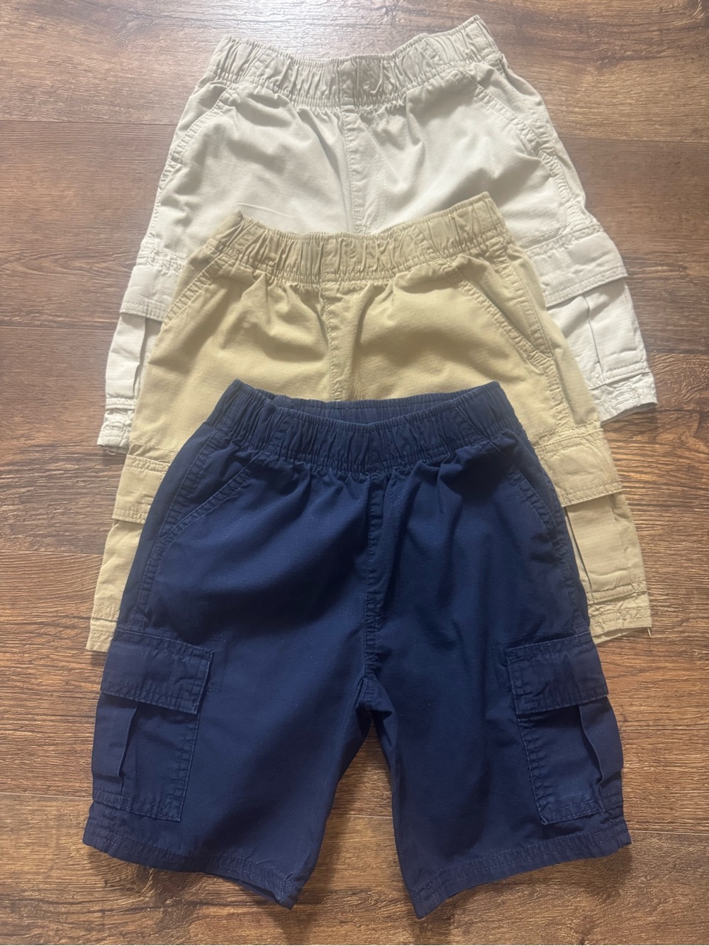 The Children’s Place Boys Cargo Shorts Trio - Navy, Khaki, Tan.
